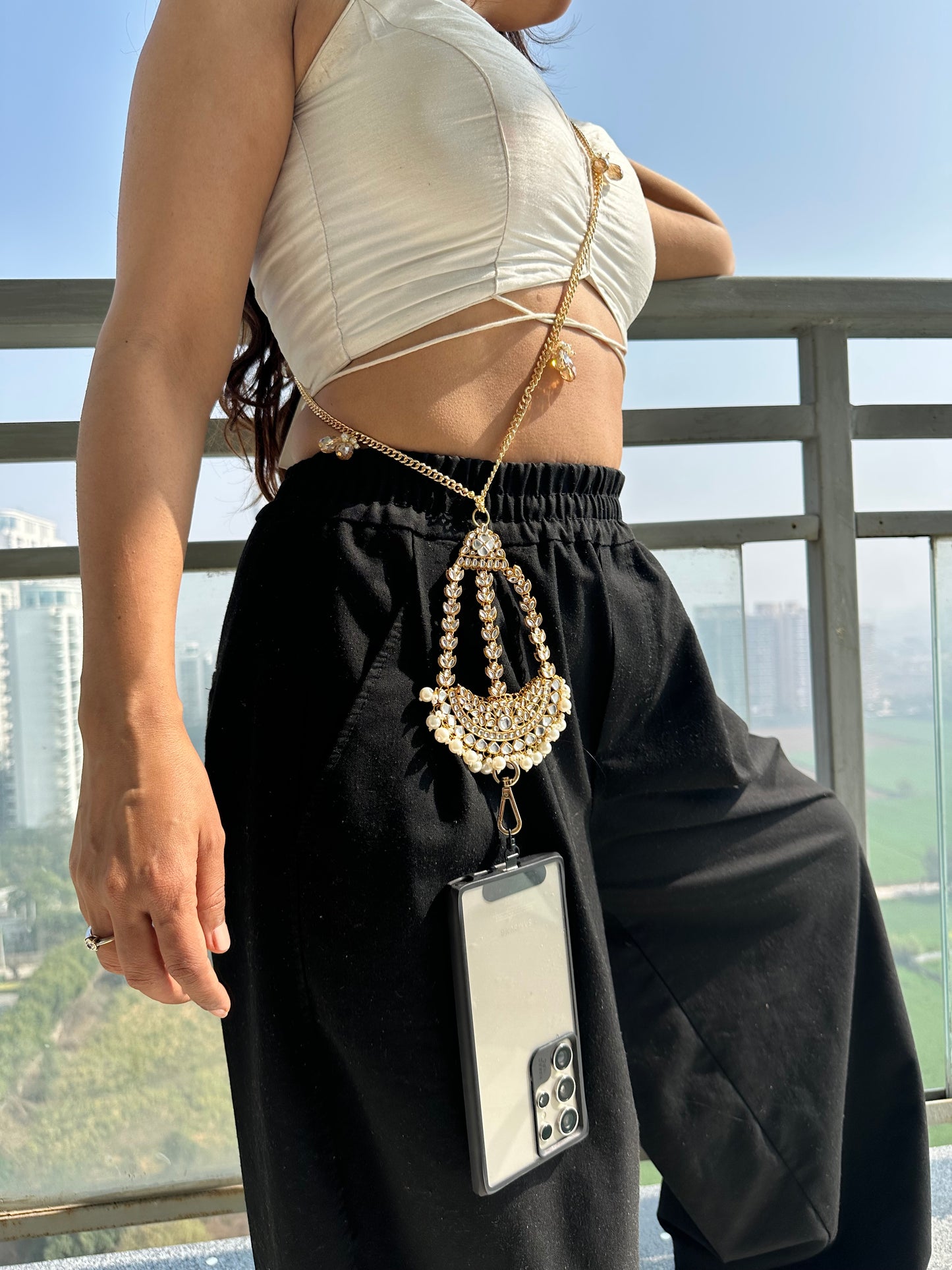 Handmade Kundan Phone Sling – Gold Crossbody Chain with Charms