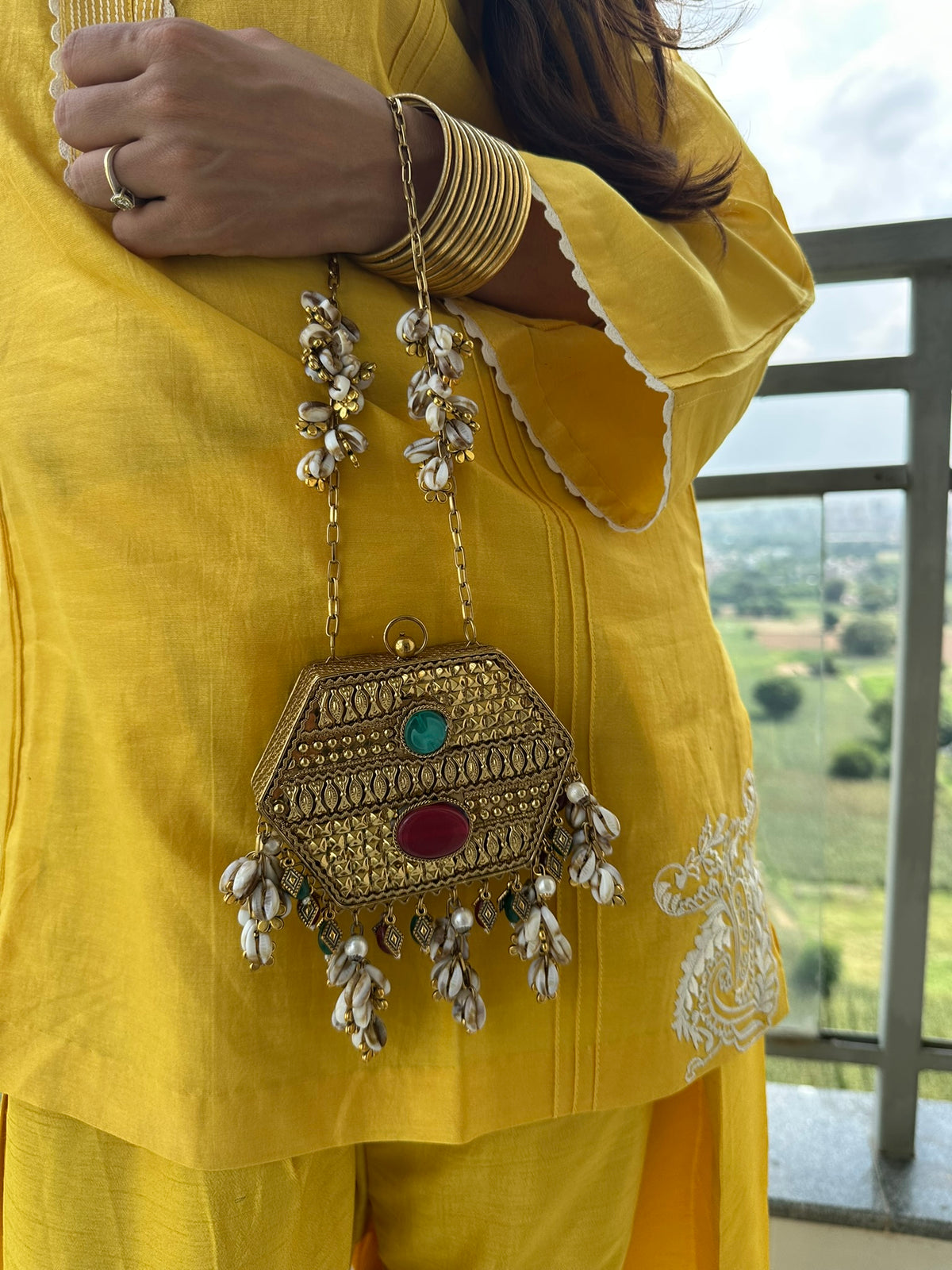 The MAYA Hexagon Clutch - Gold Gemstone & Cowrie Shell Metal Minaudière | Emerald & Ruby Stone Evening Bag with Shell Chain | Boho Tribal Purse