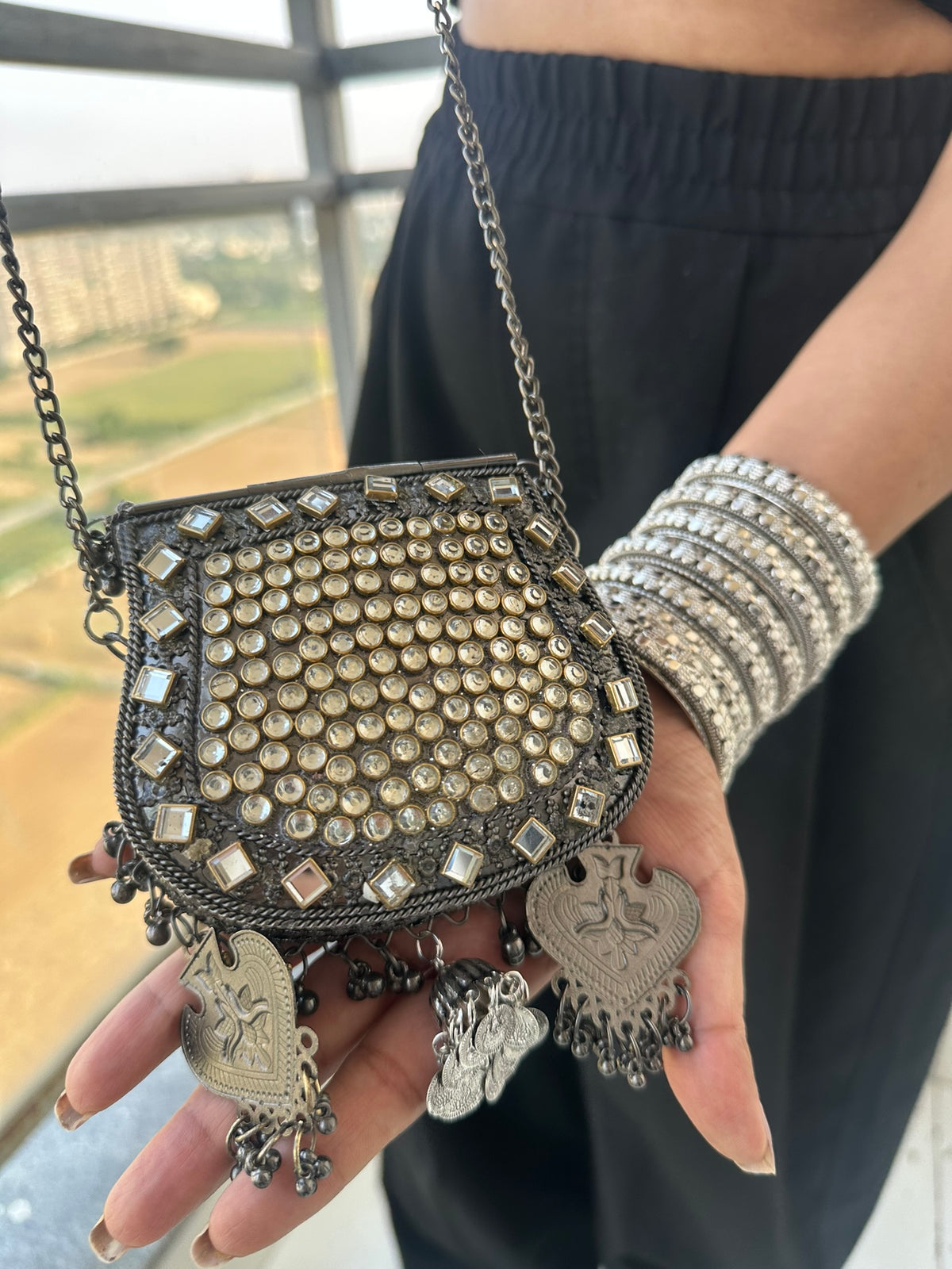 The BANJARA Handcrafted Oxidized Silver Tribal Mirror & Emerald Stone Crossbody Bag