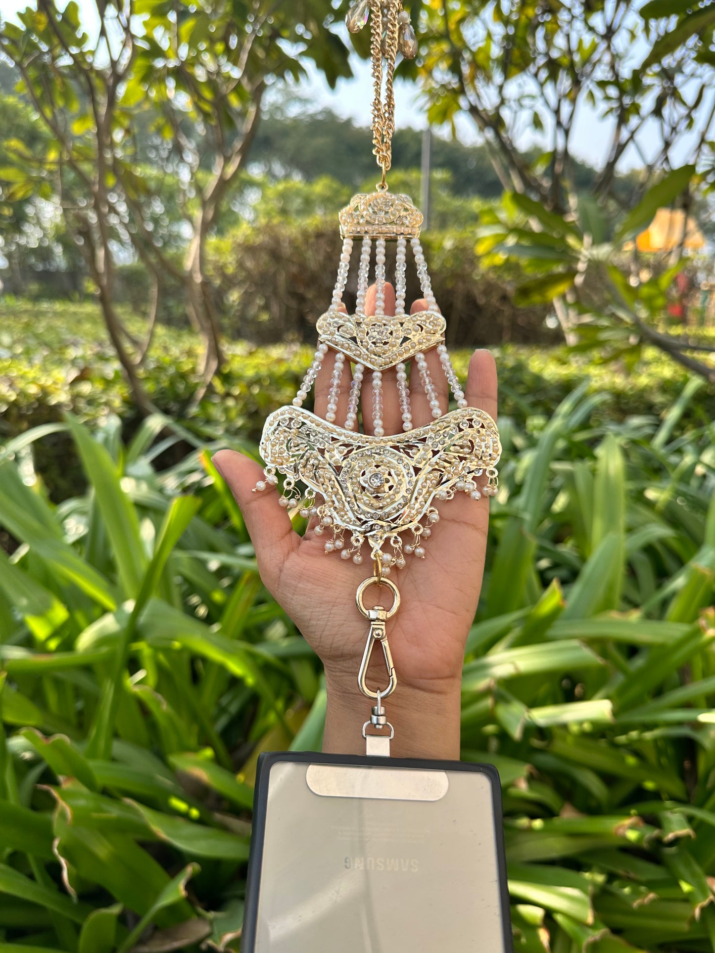 Handmade Tiered Kundan Phone Sling – Gold Crossbody Chain with Charms