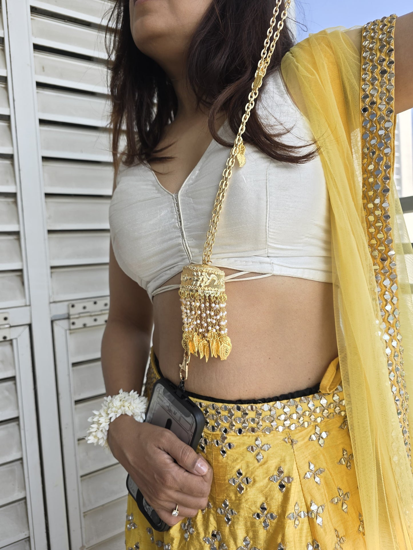 The Golden Kalira Phone Sling – Gold Wedding Chain with Universal Tether and Charms