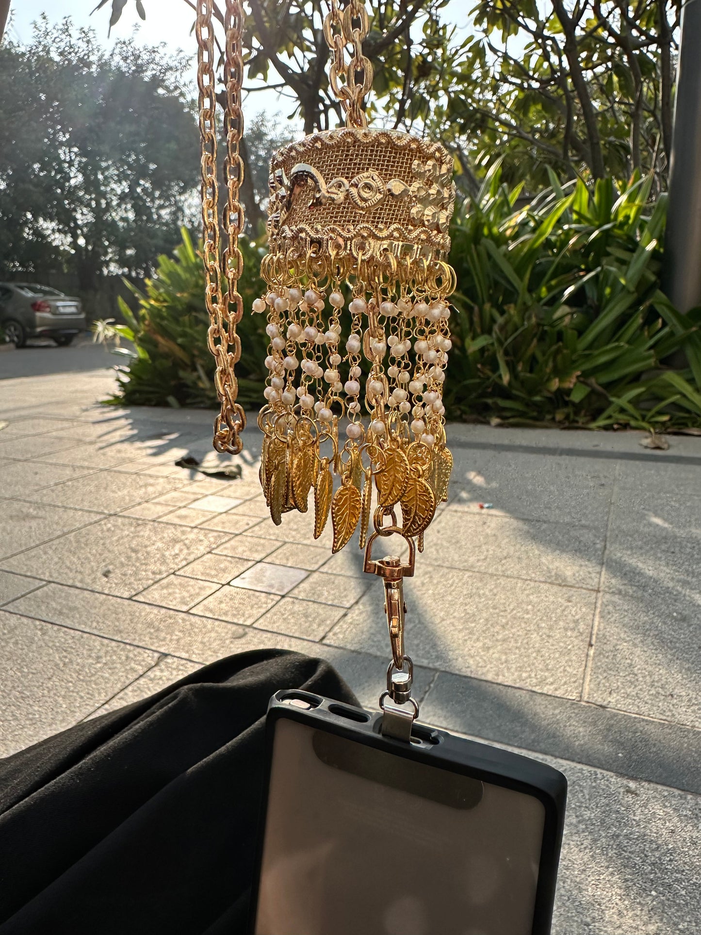 The Golden Kalira Phone Sling – Gold Wedding Chain with Universal Tether and Charms