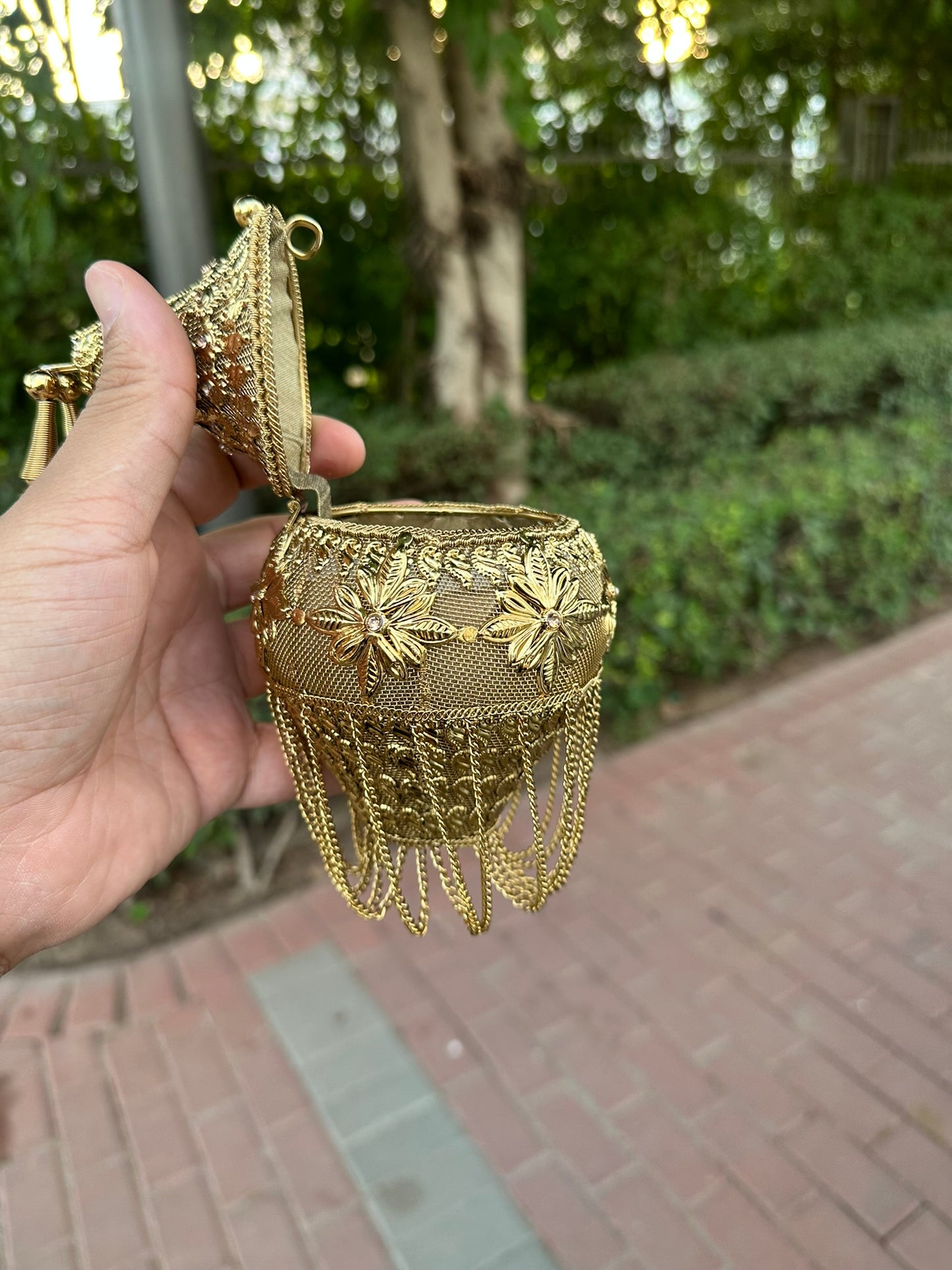 Gold Filigree Mini Potli Clutch - Vintage-Inspired Metal Minaudière with Floral Detail and Fringe Tassels