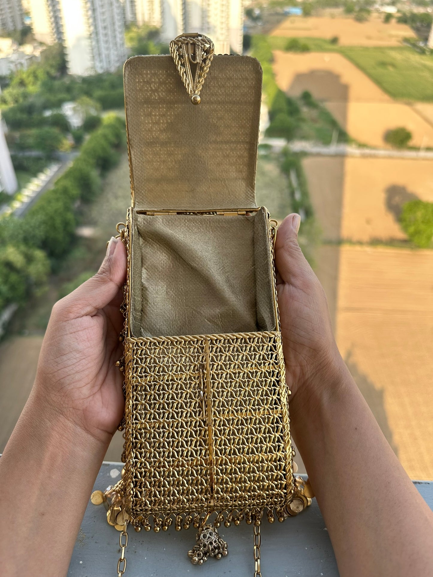 Mira Heritage Phone Sling – Hand-Woven Metallic Crossbody with Kundan Motifs, Jhumka Drops