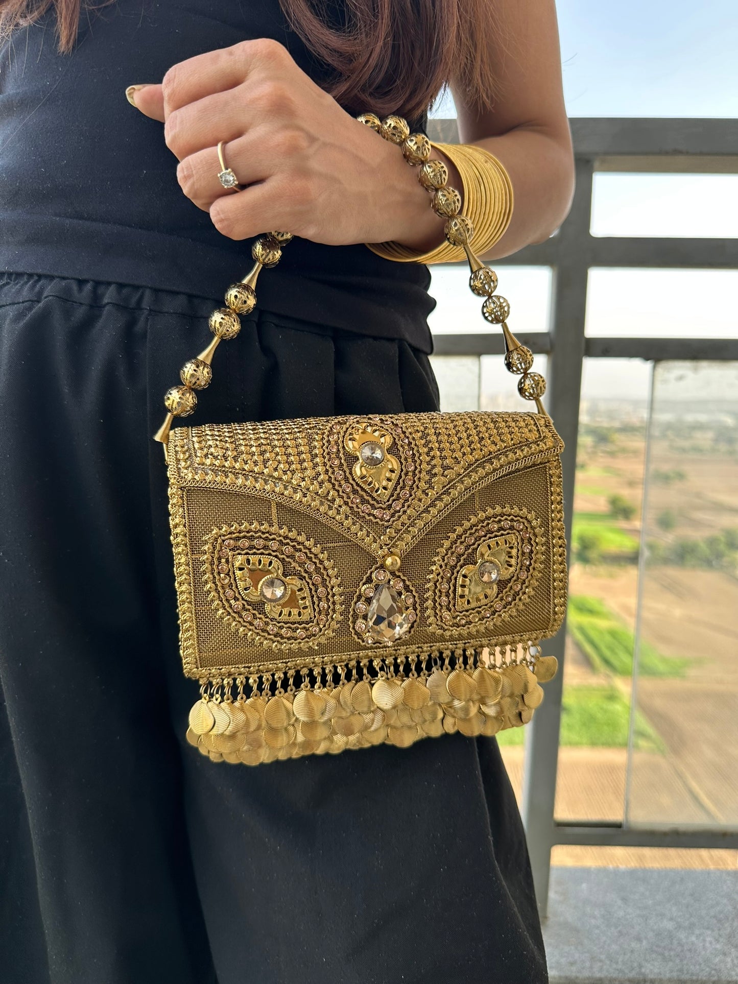 The Aria Antique Gold Embroidered Clutch with Statement Ghungroo Drops