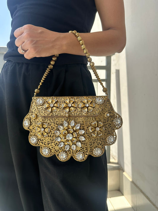 The Antique Gold Scalloped Filigree Clutch with Crystal Floral Medallions
