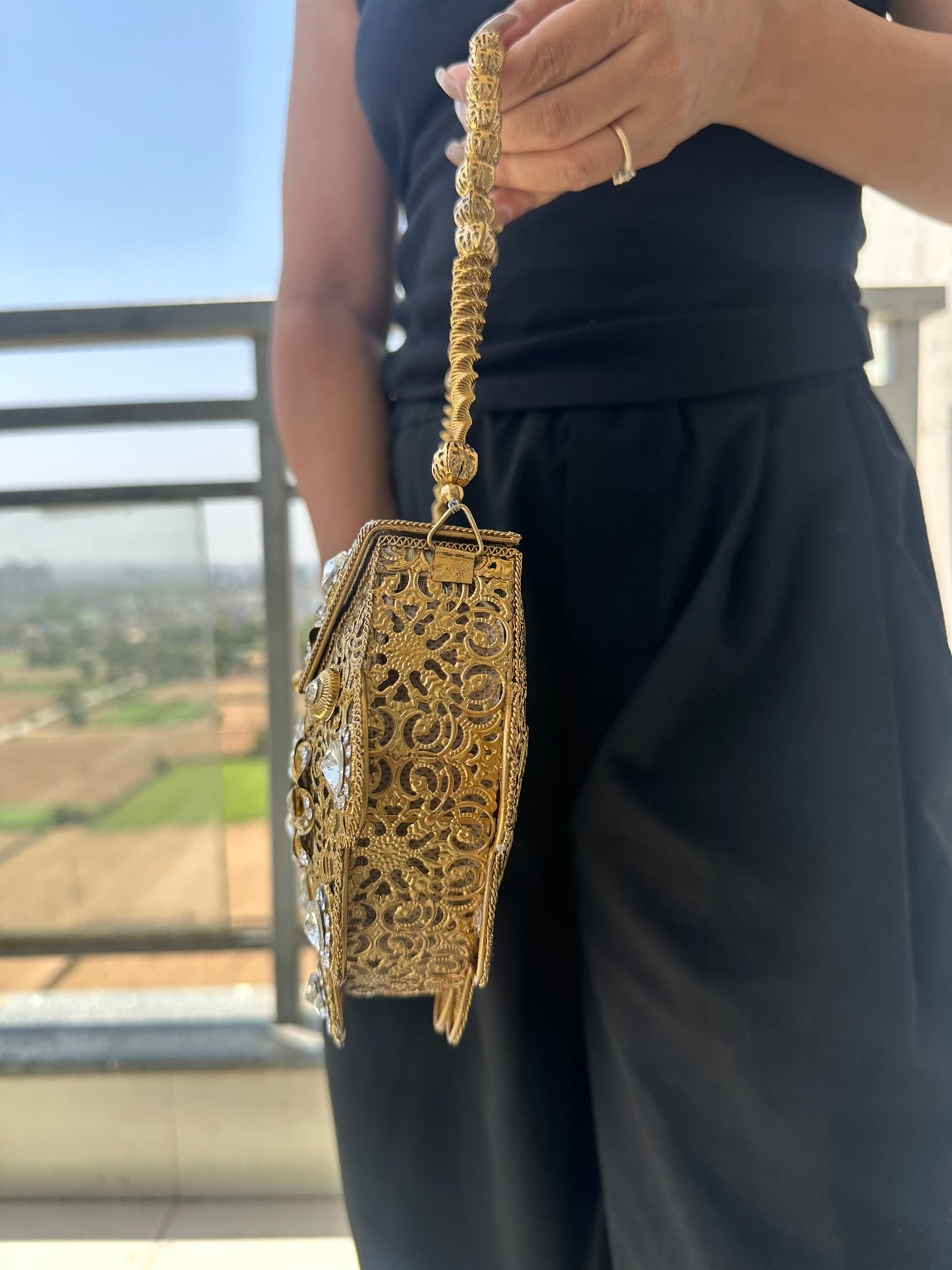The Antique Gold Scalloped Filigree Clutch with Crystal Floral Medallions