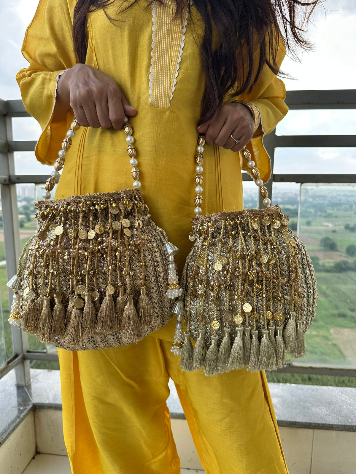 The CHANDNI Coin & Tassel Potli Collection