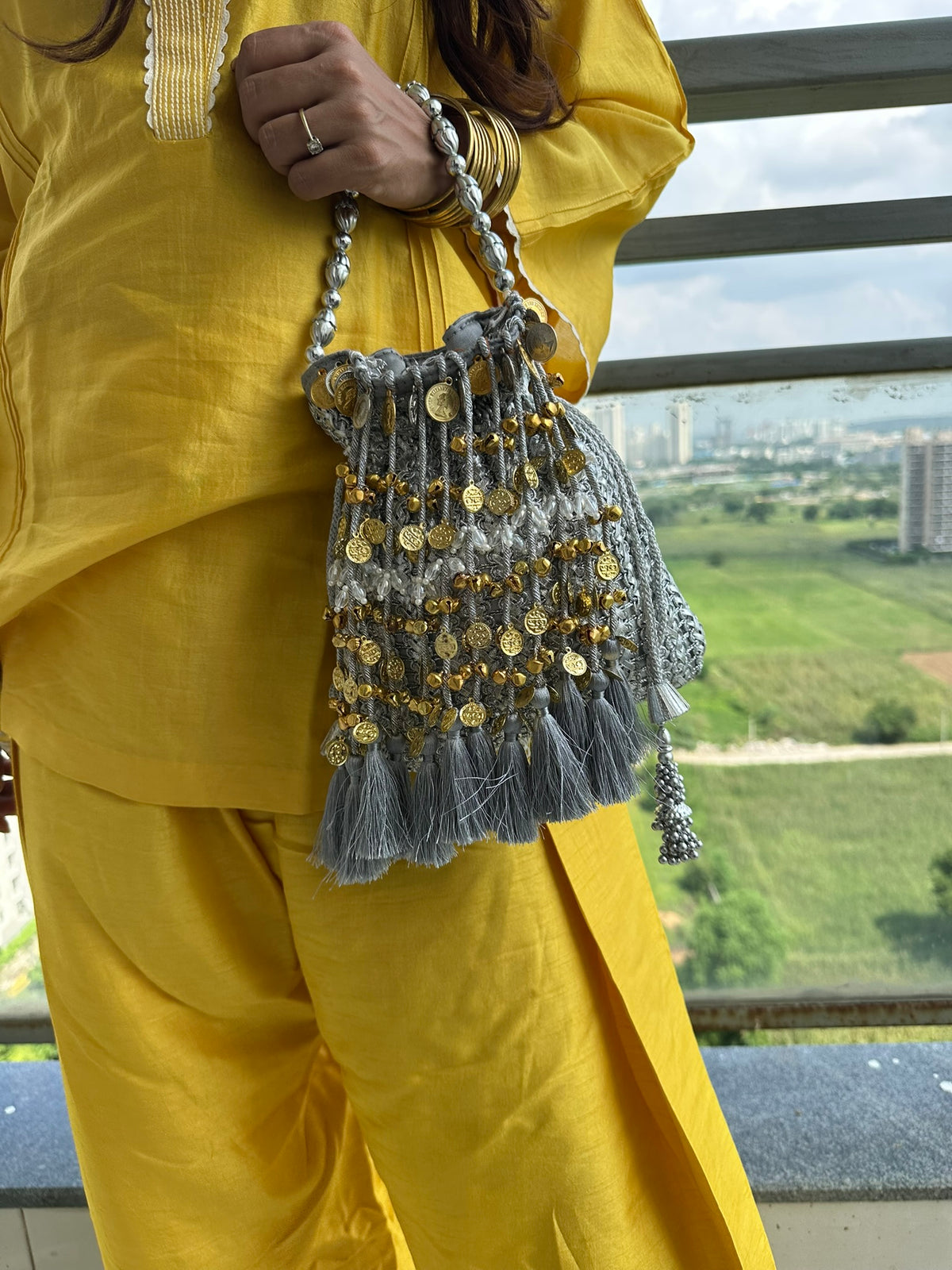The CHANDNI Coin & Tassel Potli Collection