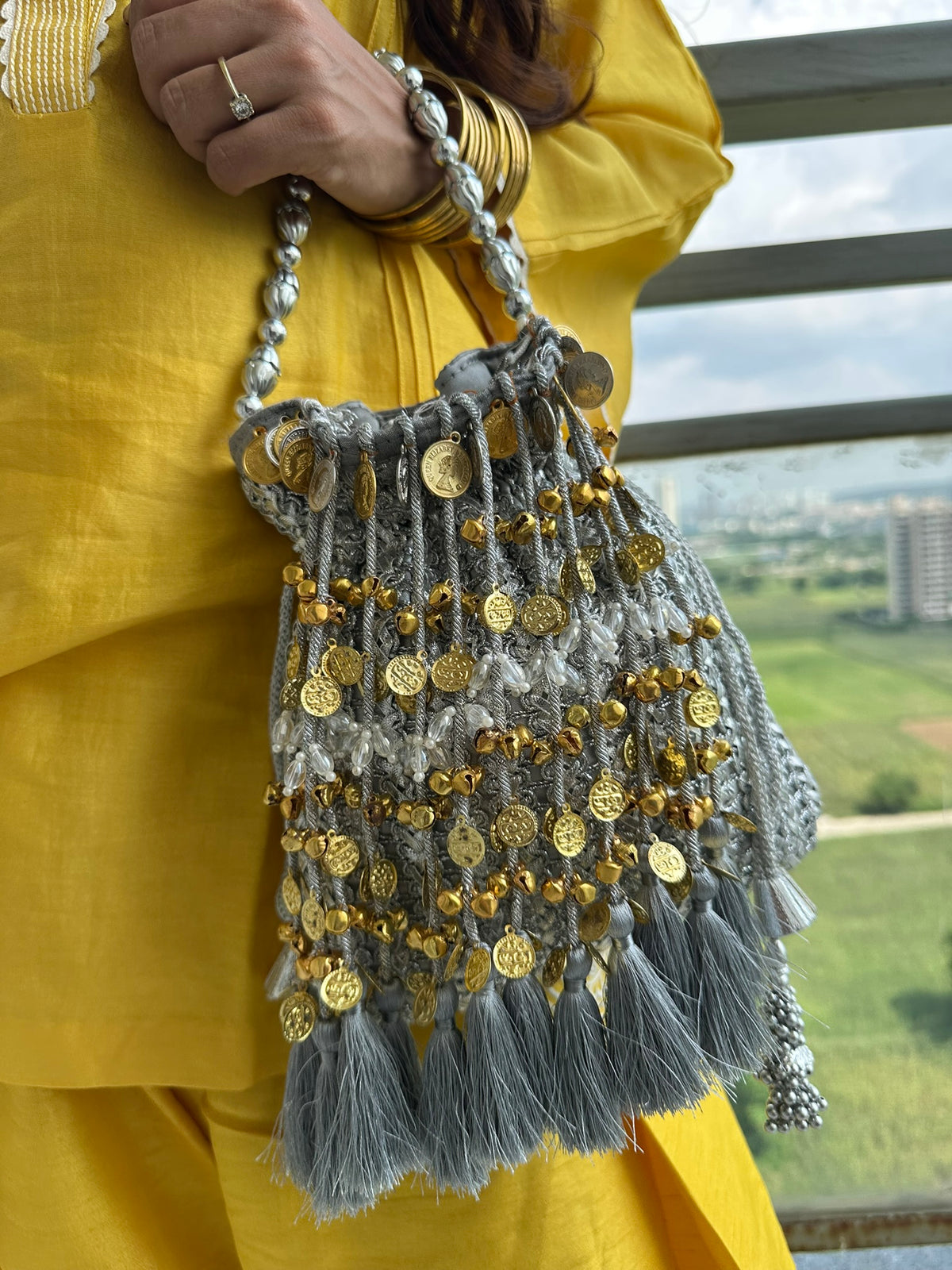 The CHANDNI Coin & Tassel Potli Collection
