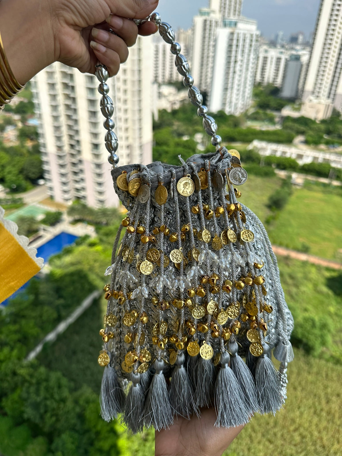 The CHANDNI Coin & Tassel Potli Collection