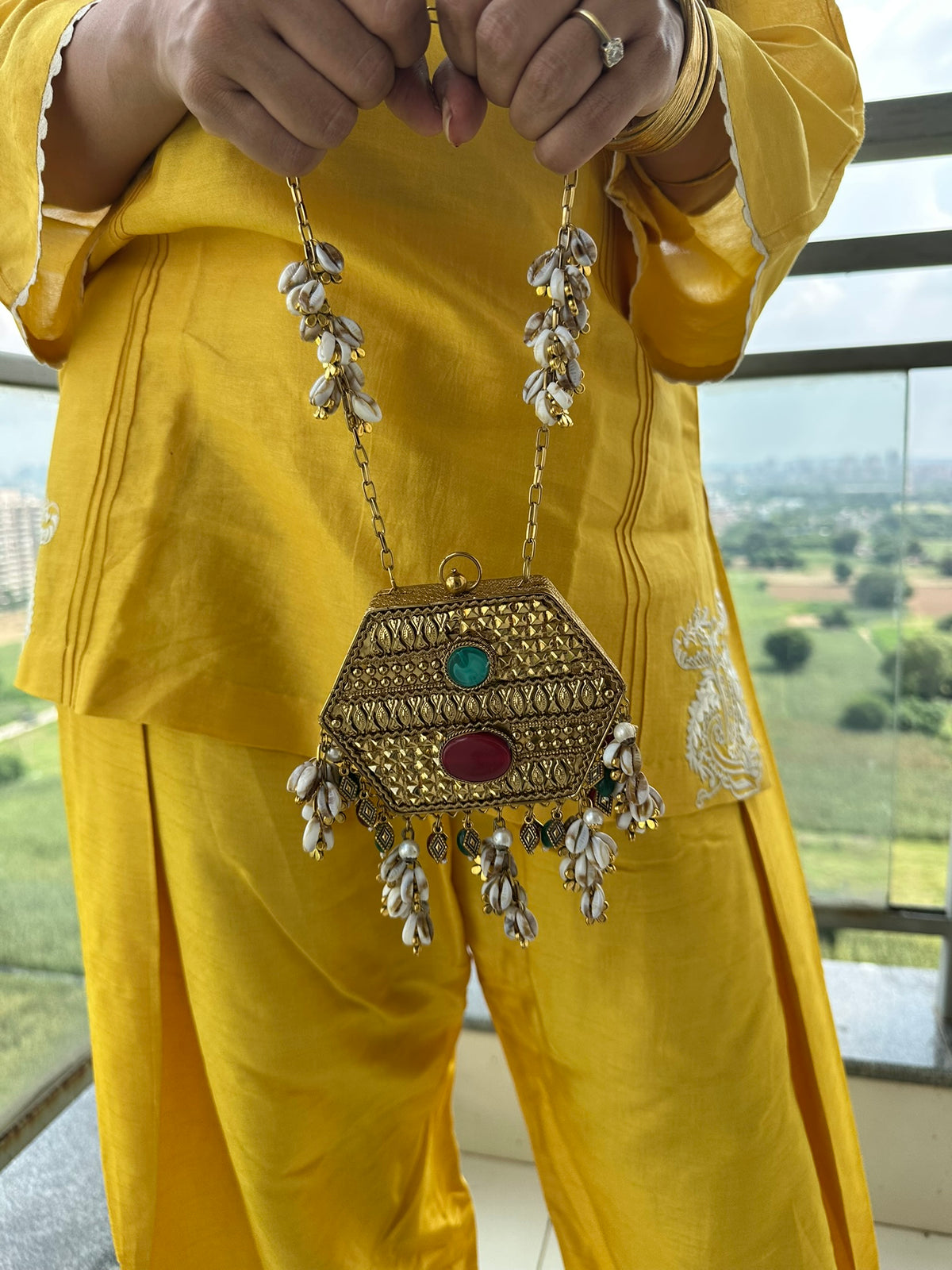 The MAYA Hexagon Clutch - Gold Gemstone & Cowrie Shell Metal Minaudière | Emerald & Ruby Stone Evening Bag with Shell Chain | Boho Tribal Purse