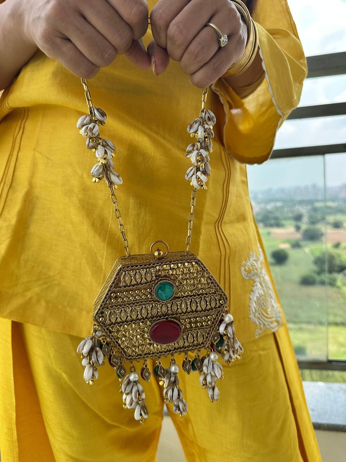 The MAYA Hexagon Clutch - Gold Gemstone & Cowrie Shell Metal Minaudière | Emerald & Ruby Stone Evening Bag with Shell Chain | Boho Tribal Purse