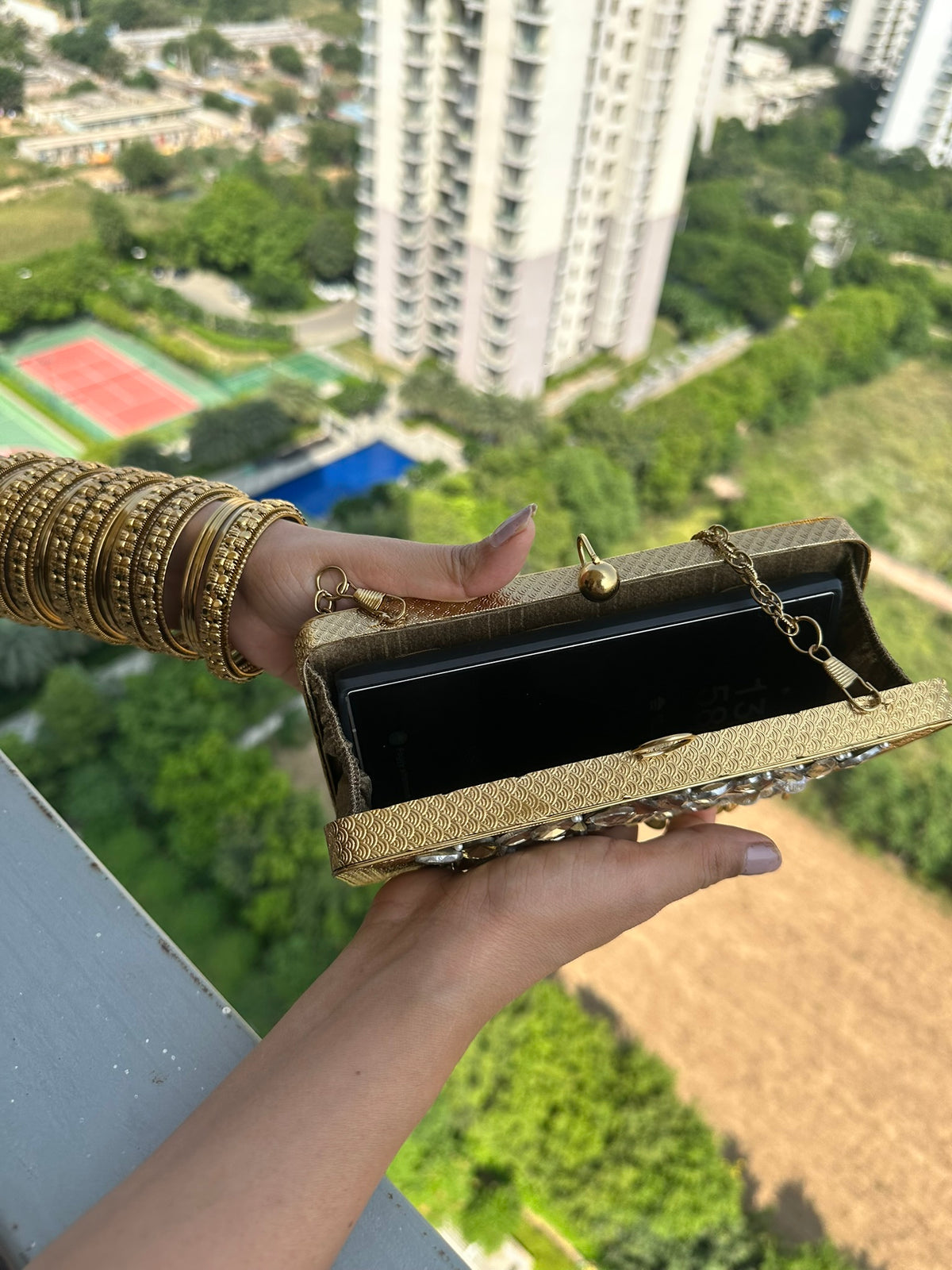 The TARINI Handcrafted Gold Filigree & Crystal Box Clutch with Coin Fringe