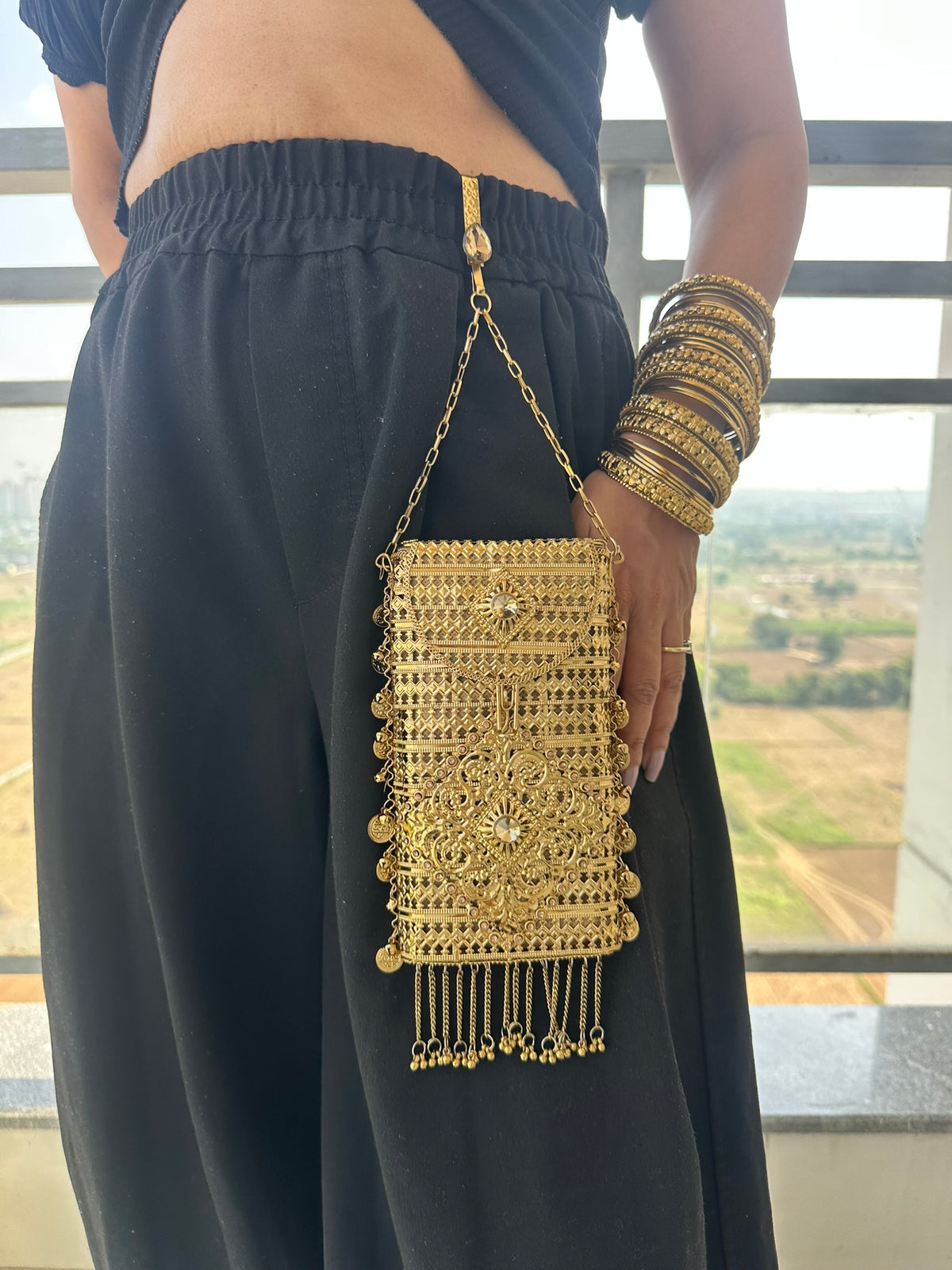 The MEERA Handcrafted Gold Filigree Phone Crossbody Clutch with Coin Charms