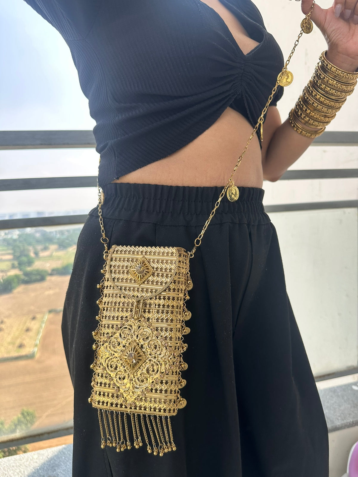 The MEERA Handcrafted Gold Filigree Phone Crossbody Clutch with Coin Charms
