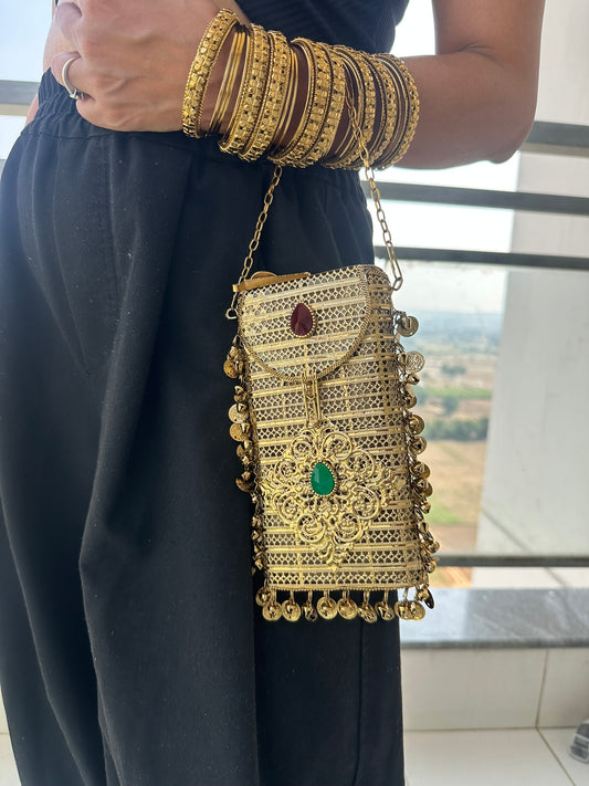 The NAYA Handcrafted Metal Phone Crossbody Clutch with Gemstones & Coin Charms