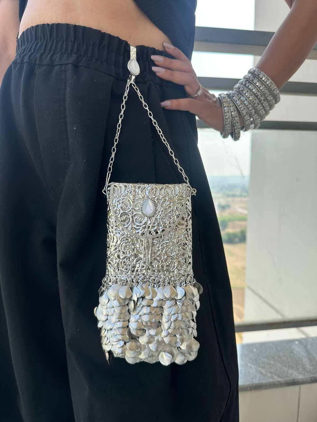 The CHANDI Handcrafted Silver Filigree Phone Crossbody Clutch with Coin Fringe