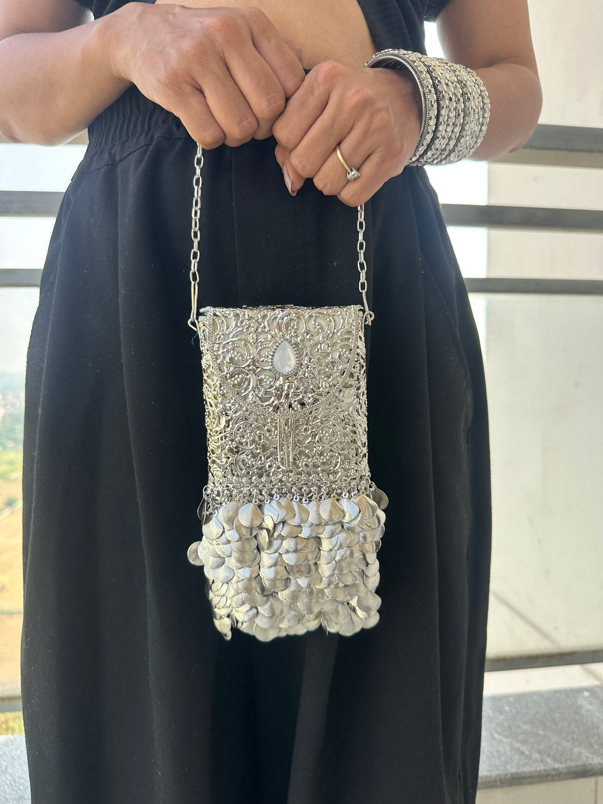 The CHANDI Handcrafted Silver Filigree Phone Crossbody Clutch with Coin Fringe