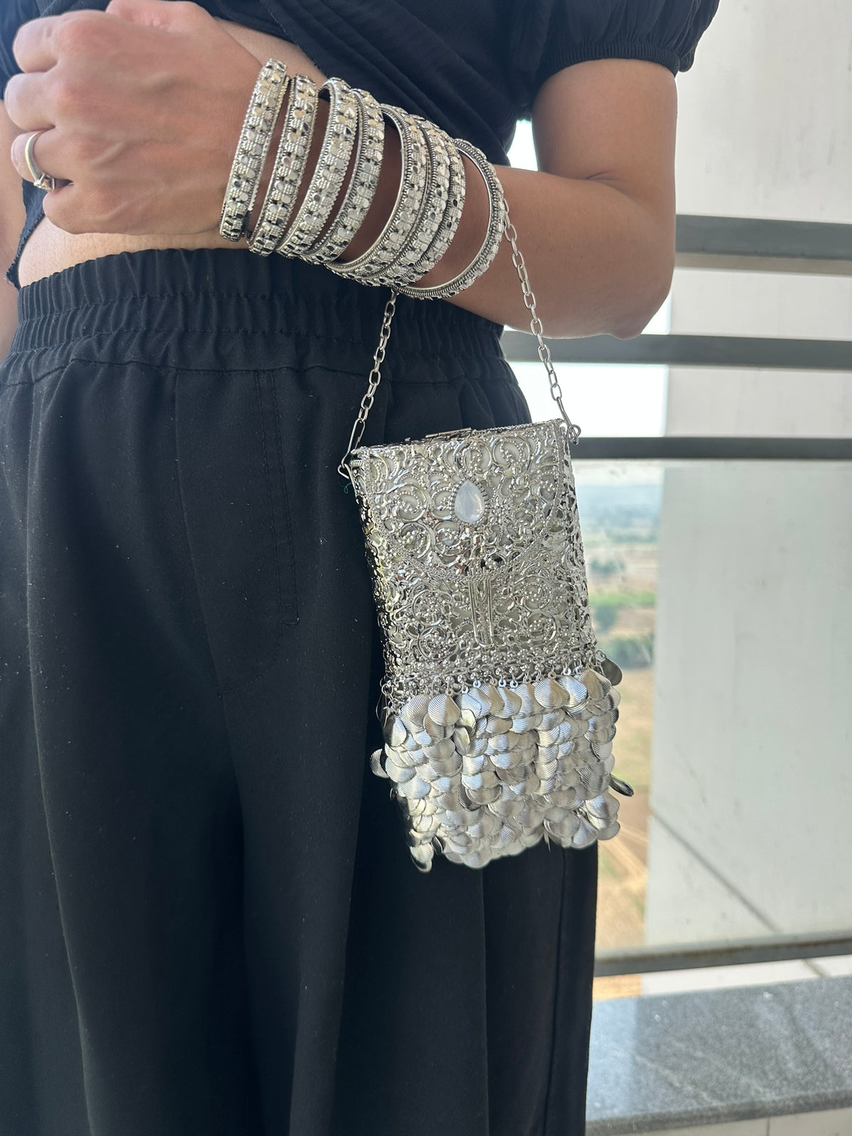 The CHANDI Handcrafted Silver Filigree Phone Crossbody Clutch with Coin Fringe