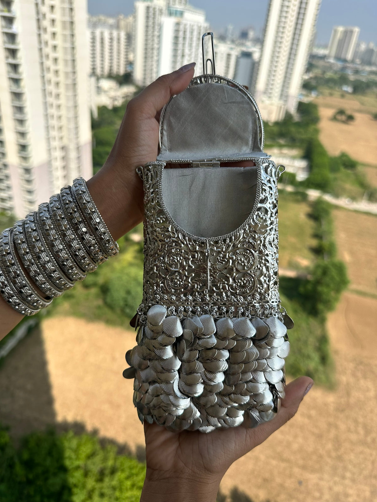 The CHANDI Handcrafted Silver Filigree Phone Crossbody Clutch with Coin Fringe