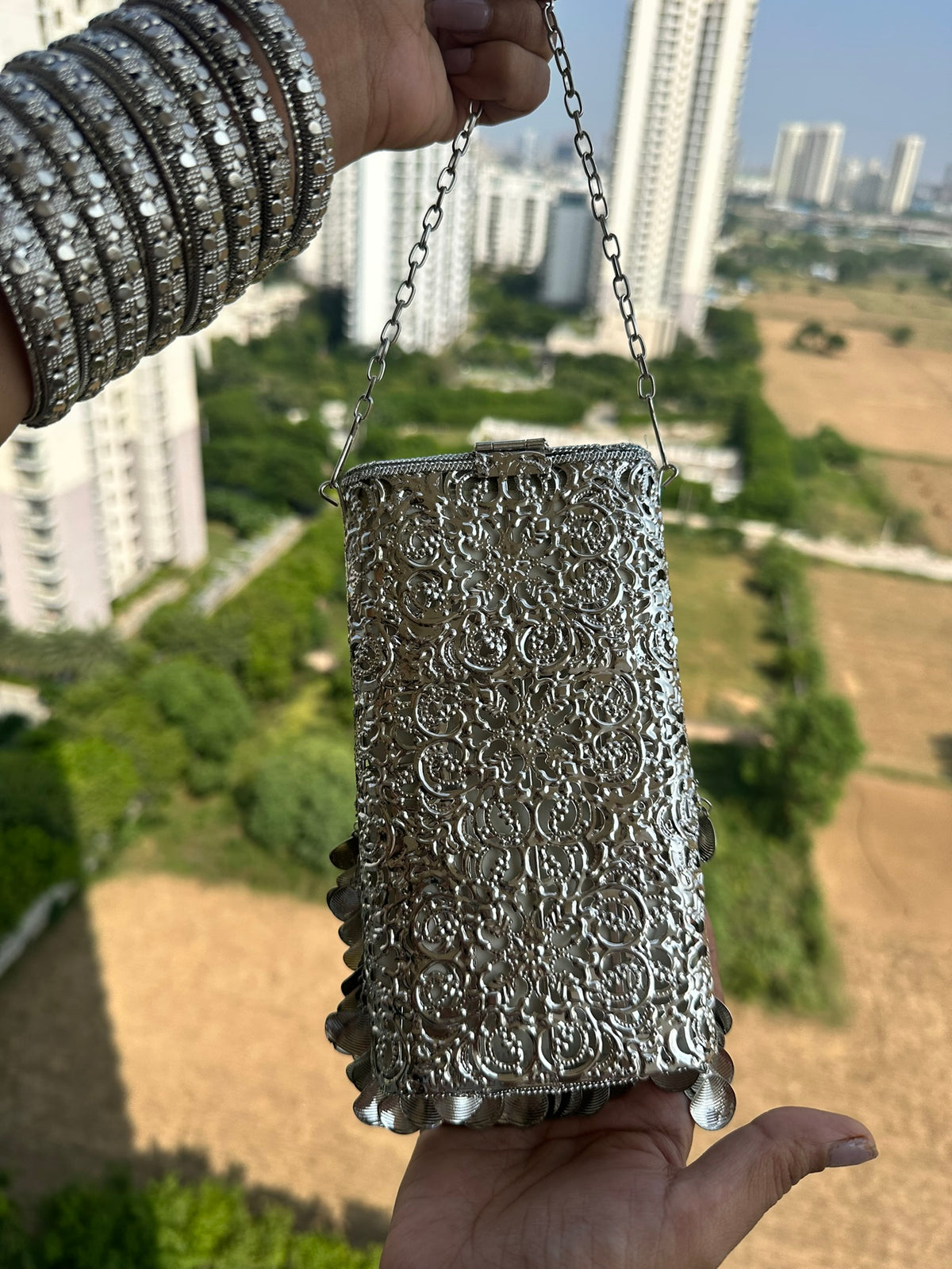 The CHANDI Handcrafted Silver Filigree Phone Crossbody Clutch with Coin Fringe