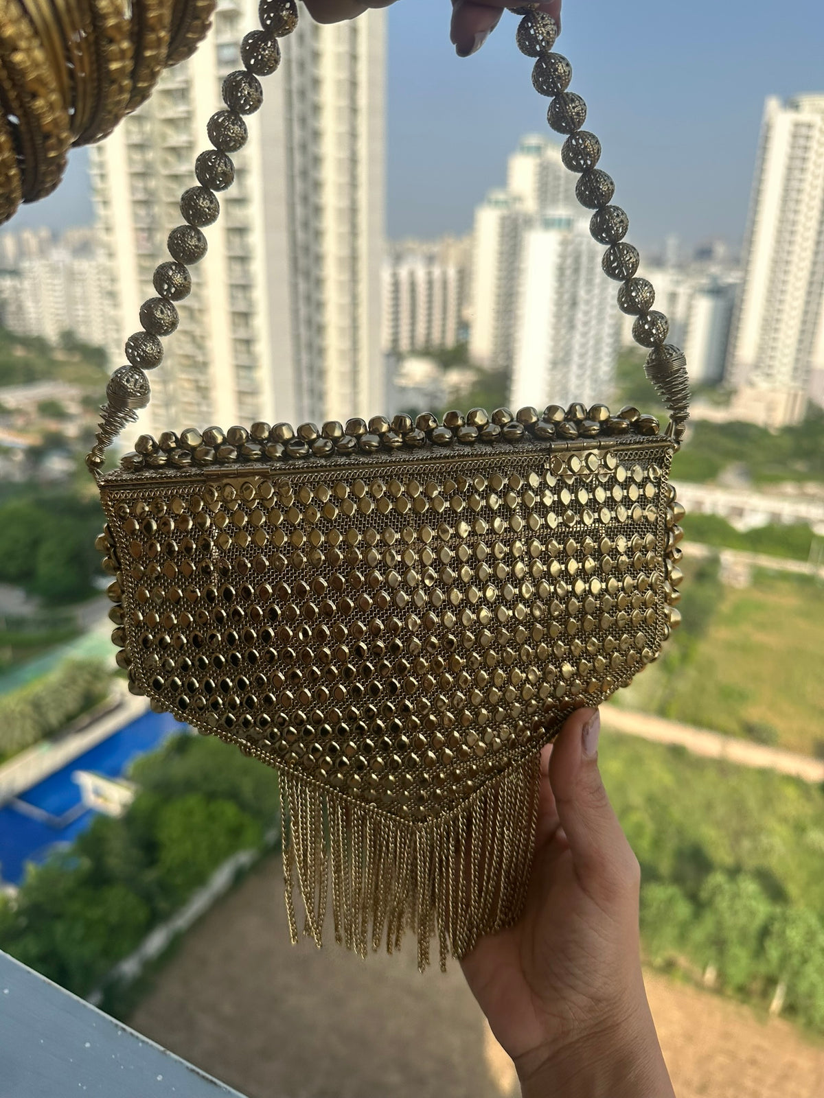 The AANYA Handcrafted Gold Filigree Chevron Envelope Clutch with Chain Fringe