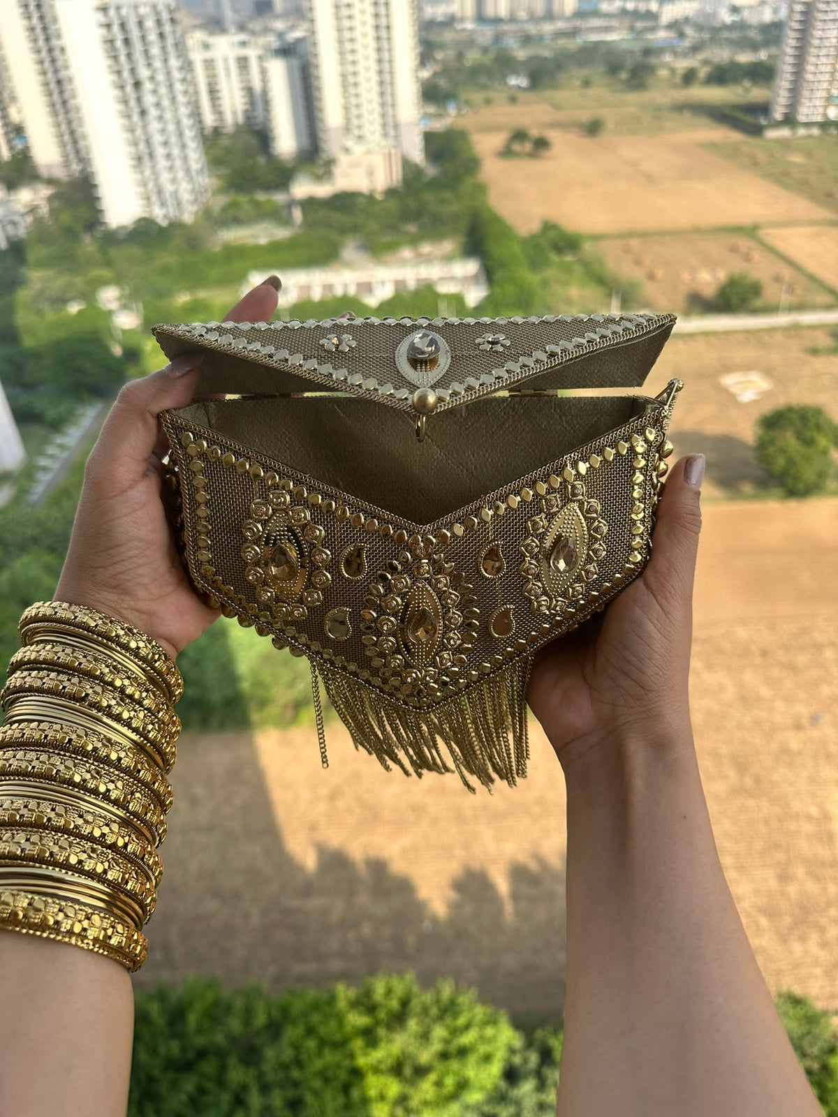The AANYA Handcrafted Gold Filigree Chevron Envelope Clutch with Chain Fringe