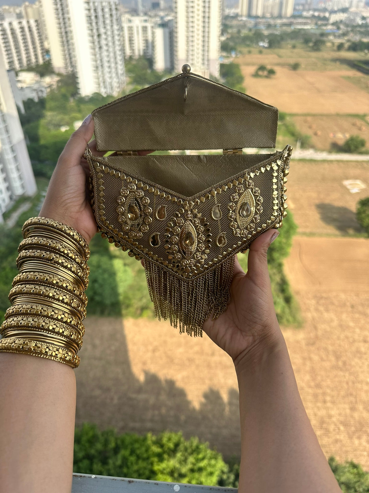 The AANYA Handcrafted Gold Filigree Chevron Envelope Clutch with Chain Fringe