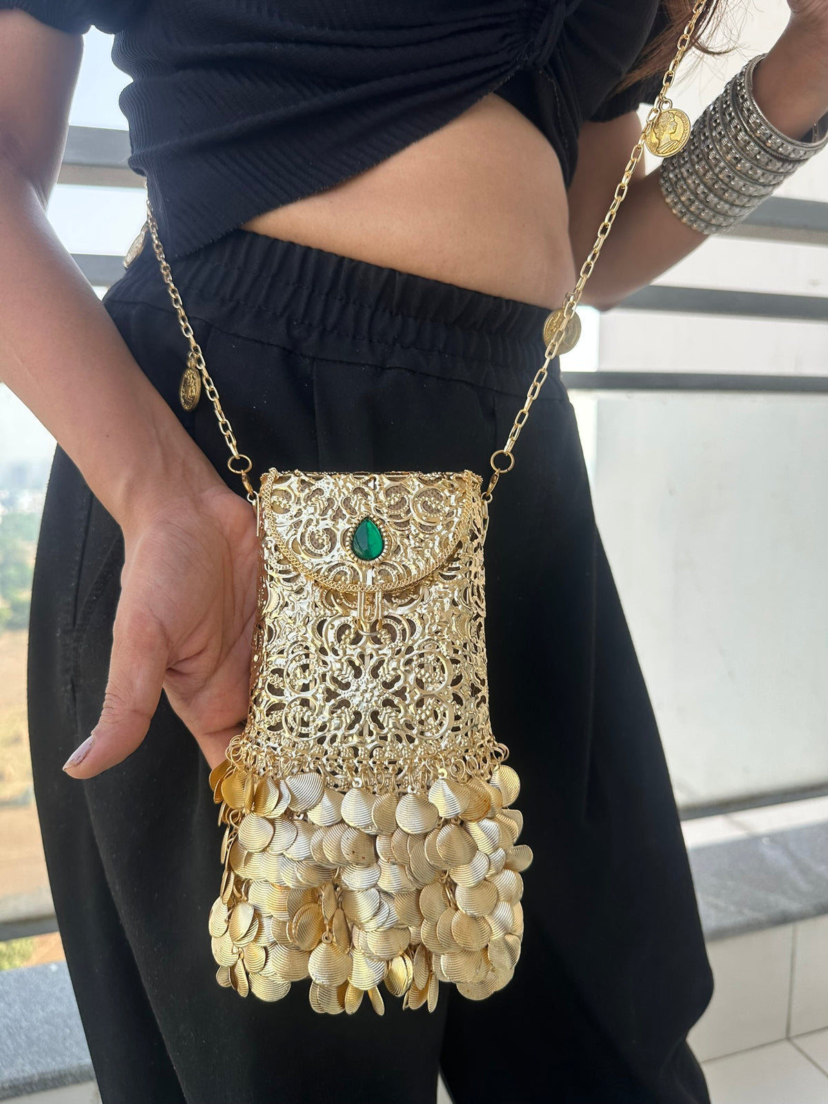 The PAAN Handcrafted Gold Filigree Phone Crossbody Clutch with Emerald Gemstone & Coin Fringe