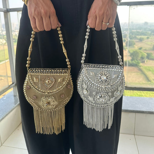 The SITARA Handcrafted Celestial Filigree Saddle Clutch with Chain Fringe
