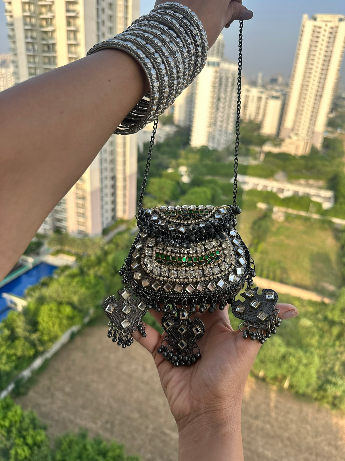 The BANJARA Handcrafted Oxidized Silver Tribal Mirror & Emerald Stone Crossbody Bag