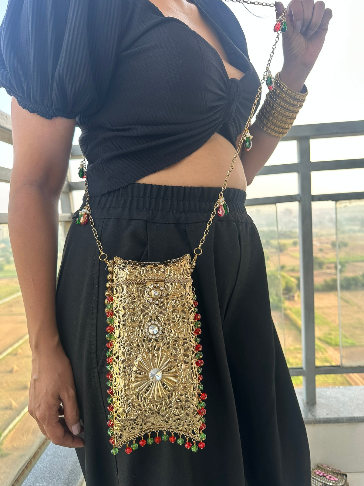 The AMEERA Handcrafted Gold Filigree Phone Clutch with Dual Straps