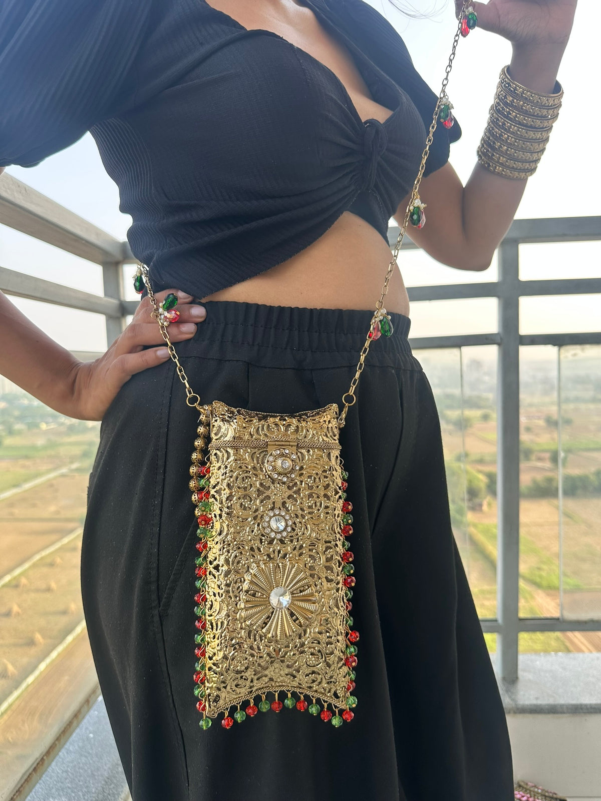 The AMEERA Handcrafted Gold Filigree Phone Clutch with Dual Straps