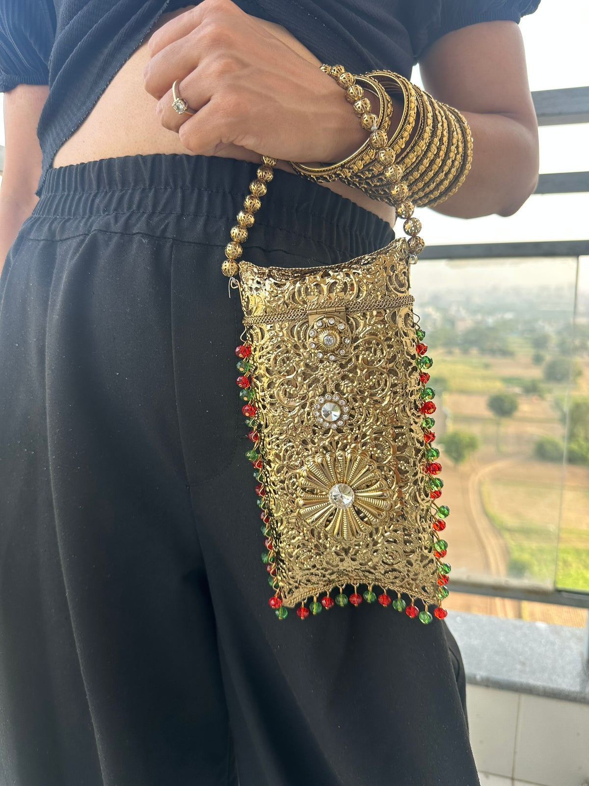The AMEERA Handcrafted Gold Filigree Phone Clutch with Dual Straps