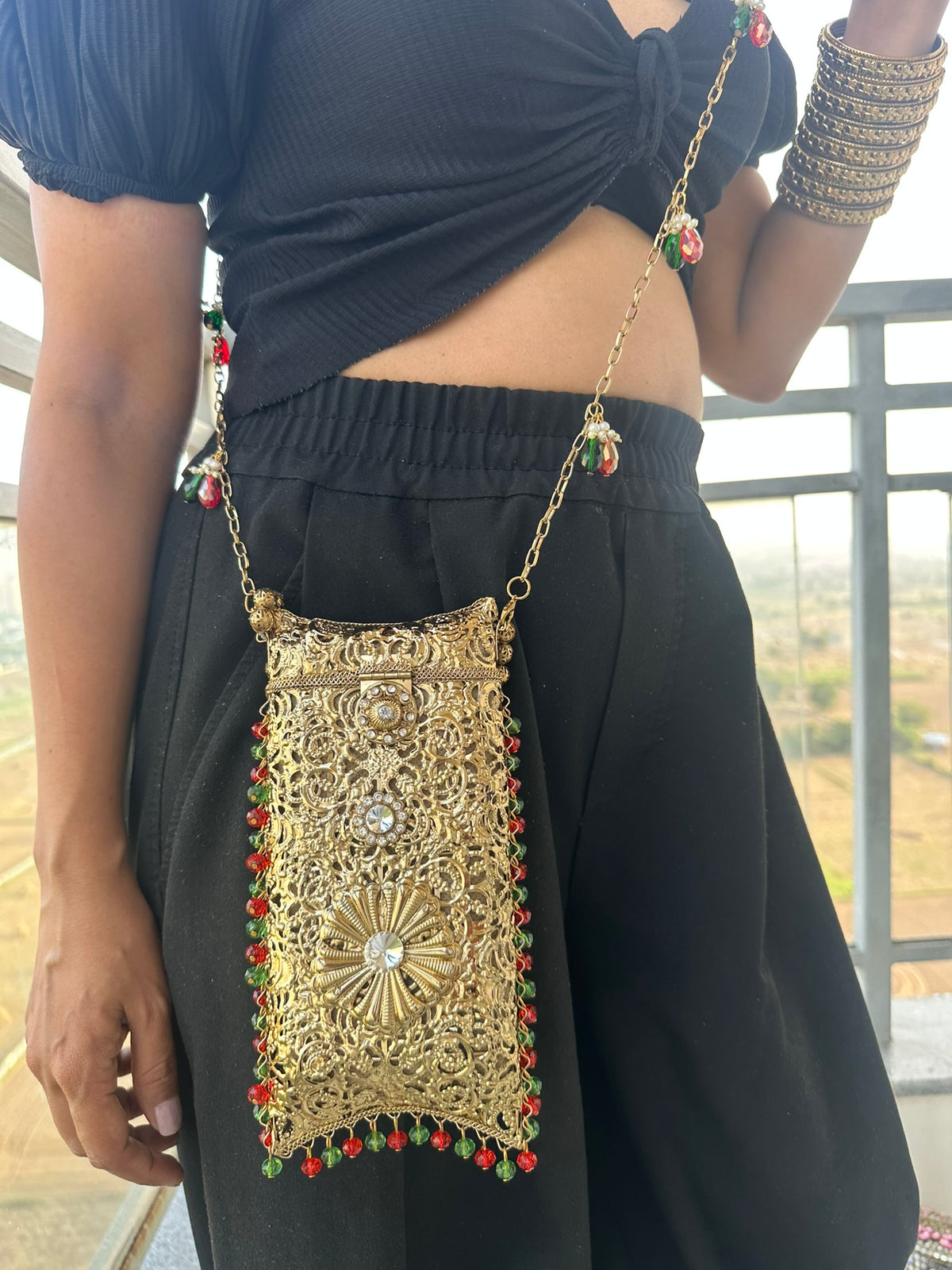 The AMEERA Handcrafted Gold Filigree Phone Clutch with Dual Straps