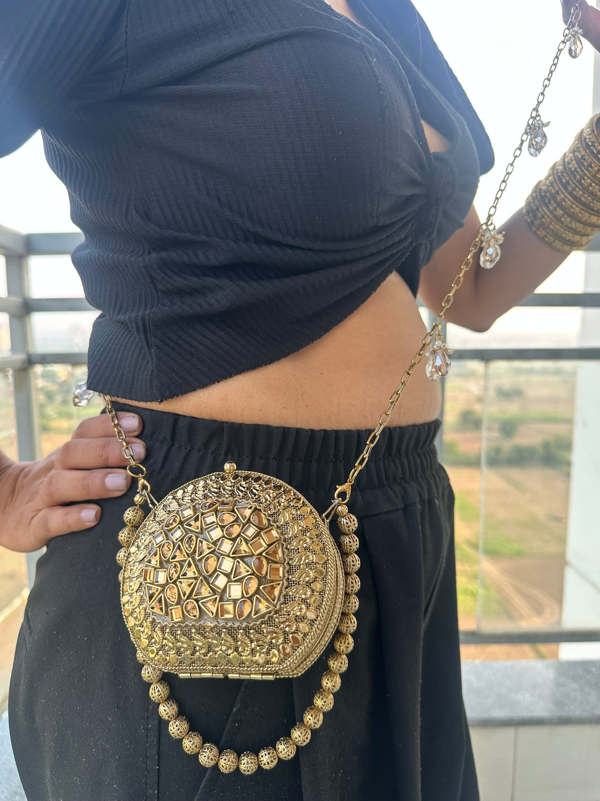 The KAVYA Handcrafted Antique Gold Oval Filigree & Amber Mirror Clutch