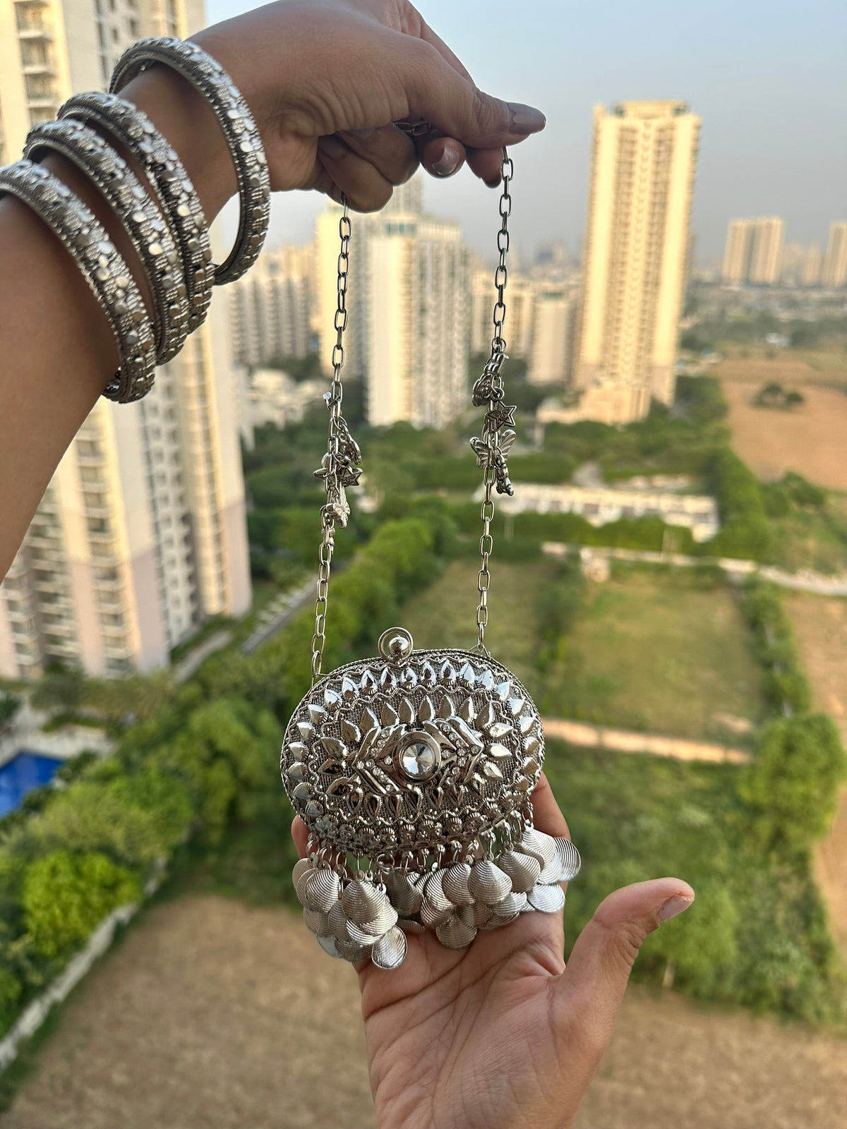 The SAHIBA Vintage Oval Metal Coin Purse | Handcrafted Oval Metal Minaudiere Banjara Charm Sling Ghungroo Party Purse