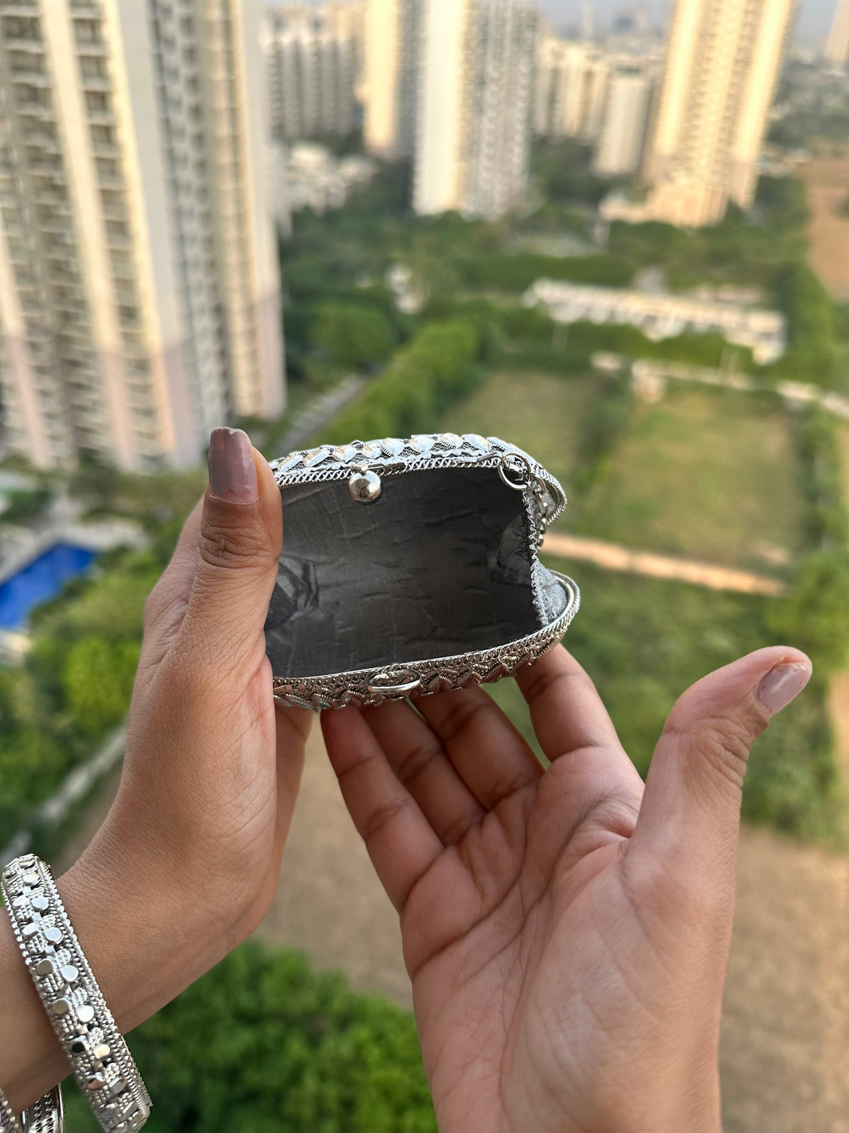 The SAHIBA Vintage Oval Metal Coin Purse | Handcrafted Oval Metal Minaudiere Banjara Charm Sling Ghungroo Party Purse
