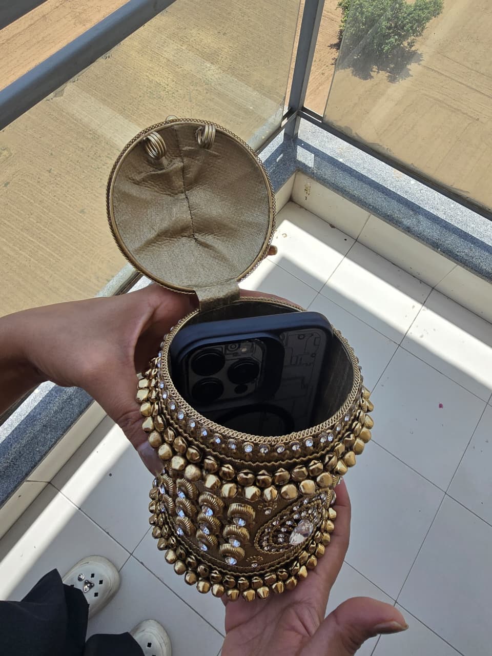 The Zara Antique Gold Cylindrical Capsule Clutch with Statement Tassel