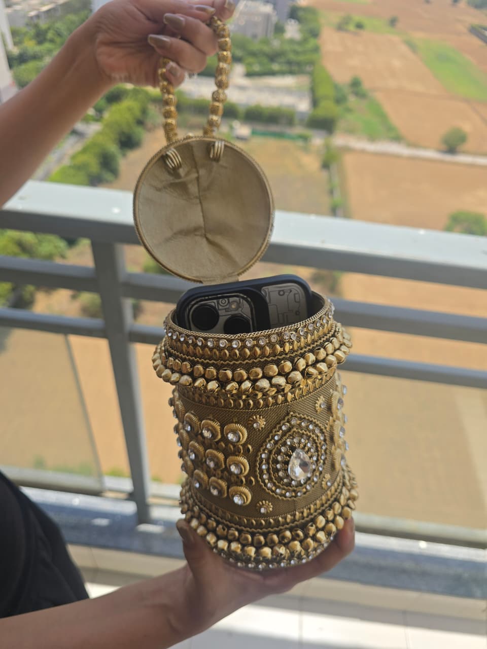 The Zara Antique Gold Cylindrical Capsule Clutch with Statement Tassel