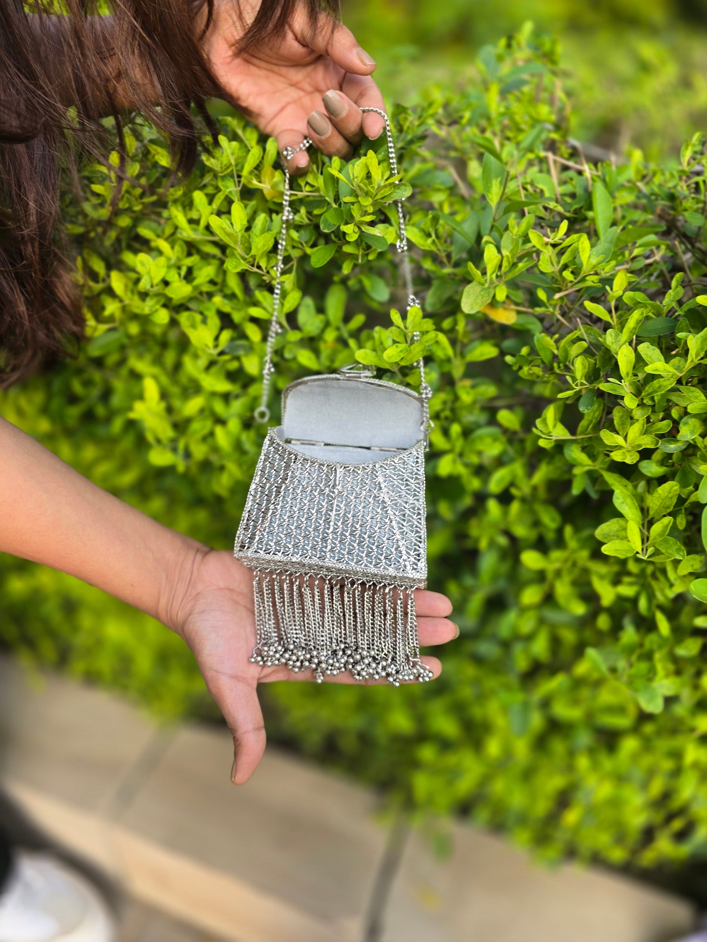 Noor Tassel Minaudière Clutch bag