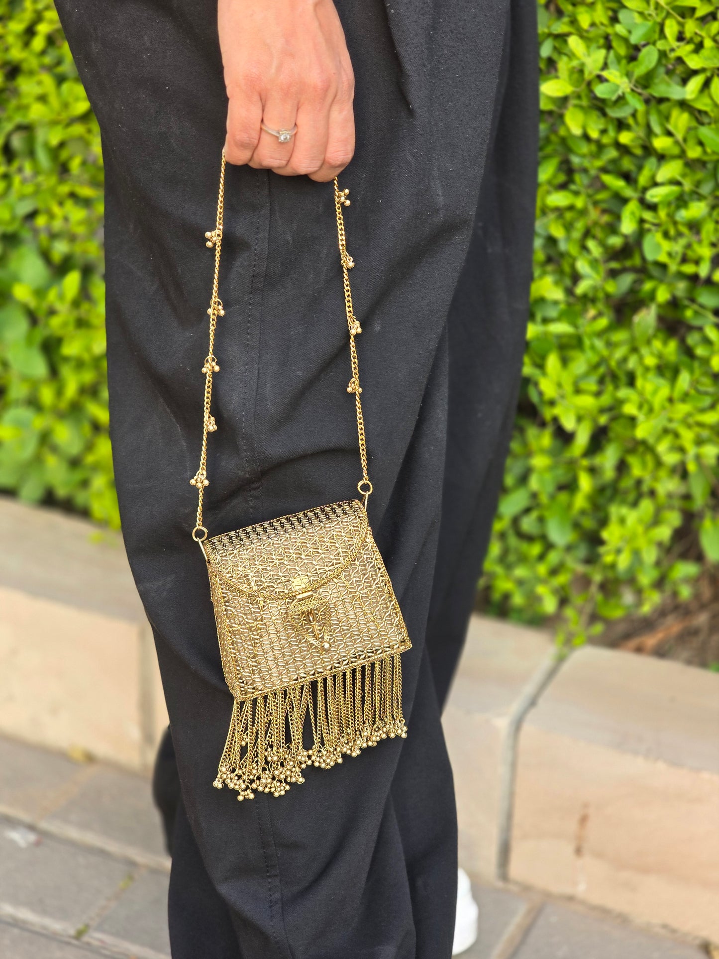 Noor Tassel Minaudière Clutch bag