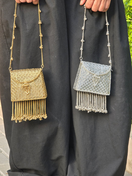 Noor Tassel Minaudière Clutch bag