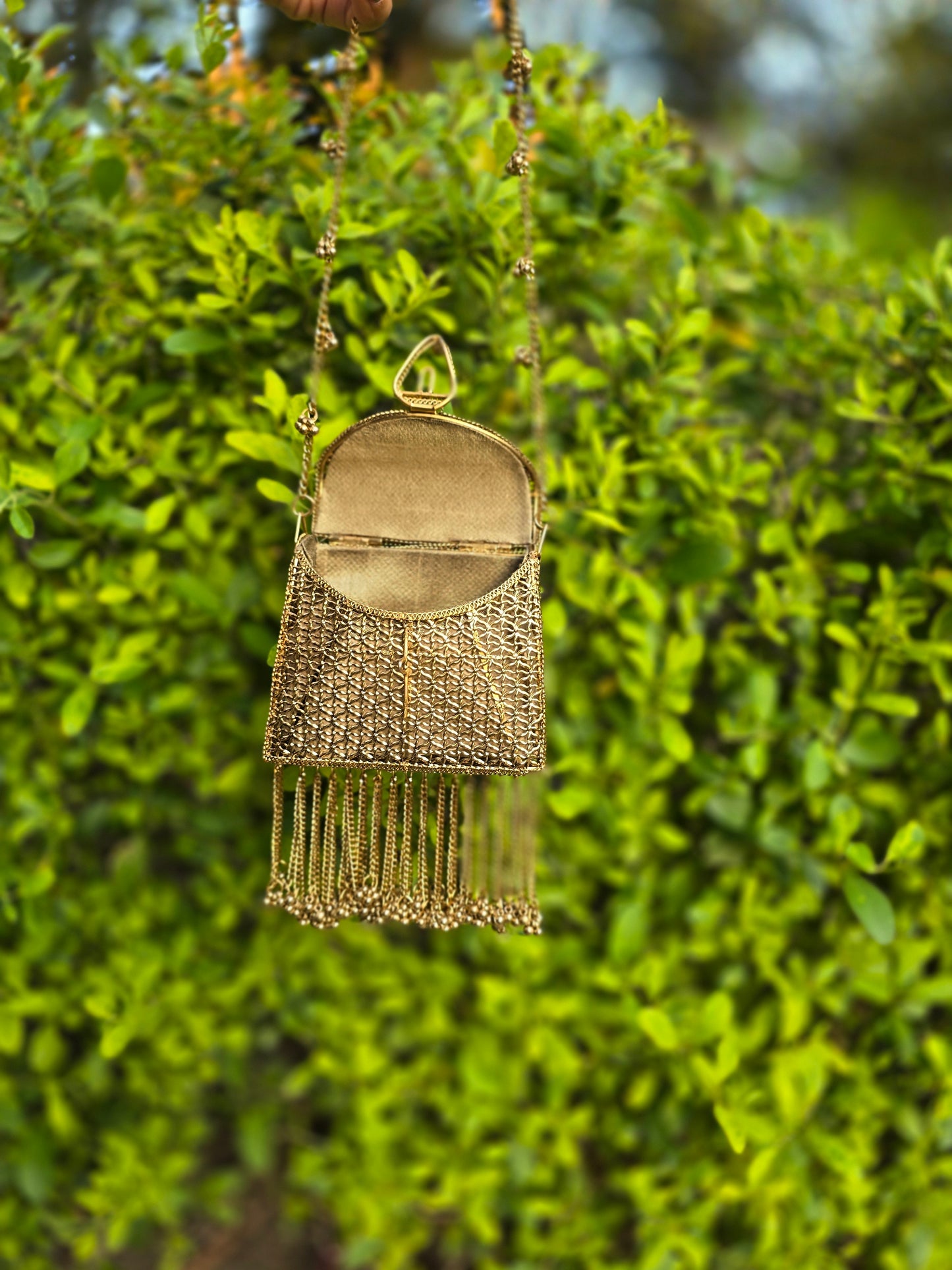 Noor Tassel Minaudière Clutch bag