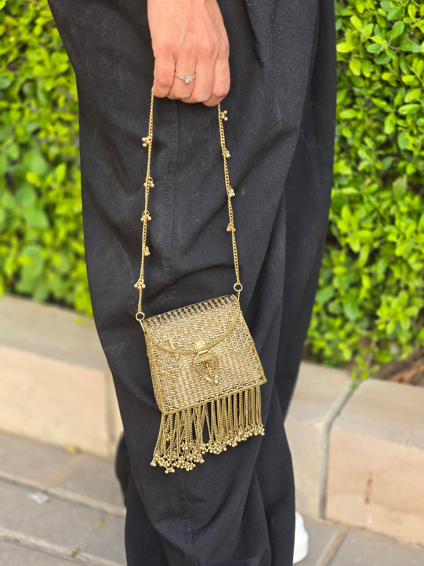 Noor Tassel Minaudière Clutch bag