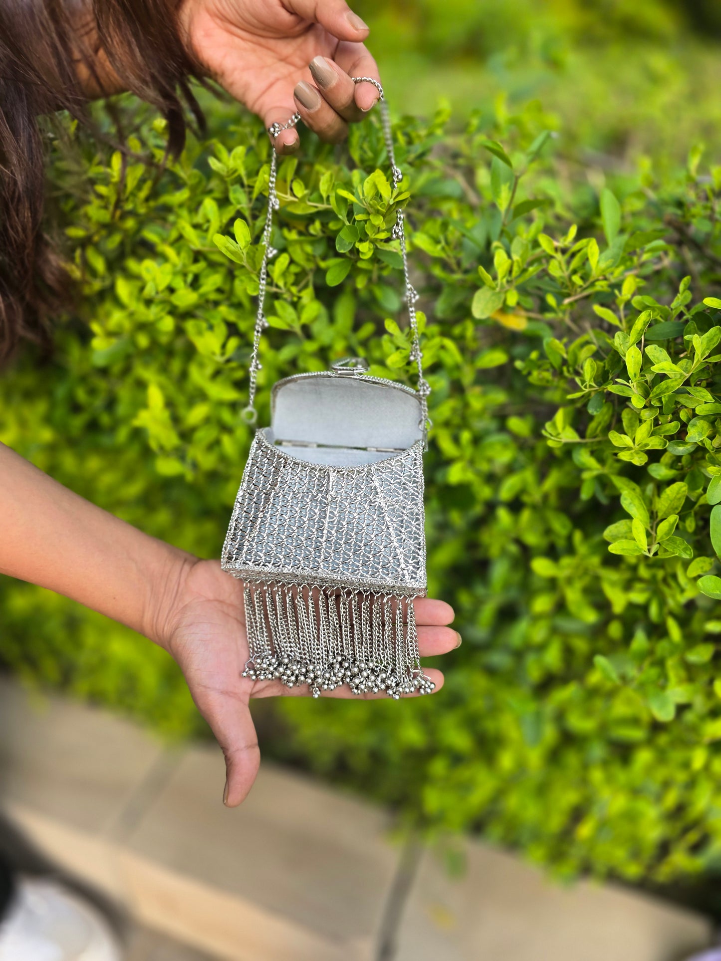 Noor Tassel Minaudière Clutch bag