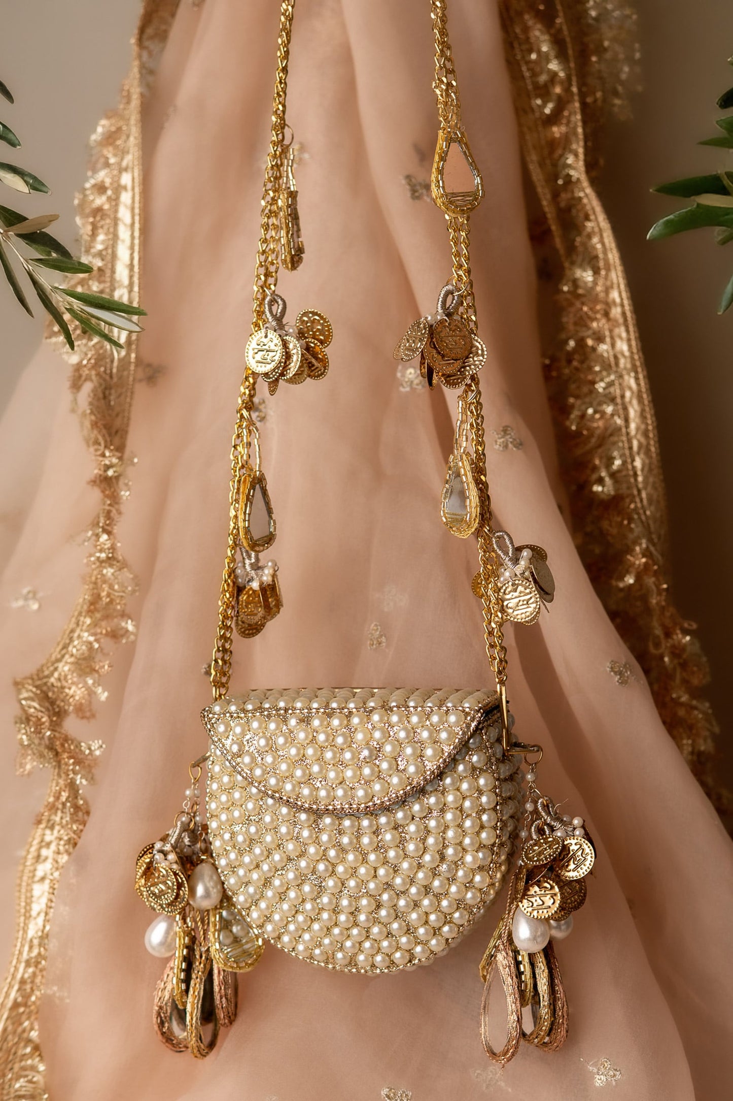 Mehfil-e-Noor Tassel clutch bag