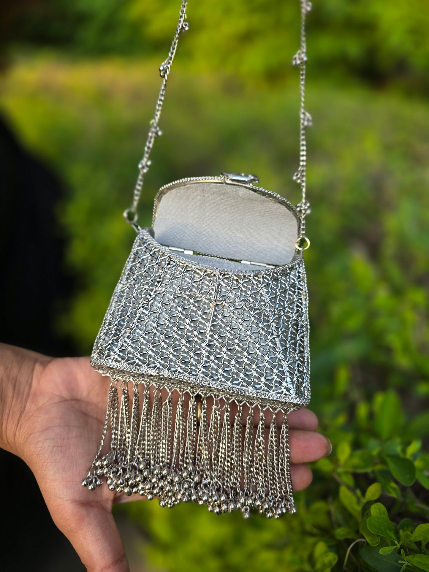 Noor Tassel Minaudière Clutch bag